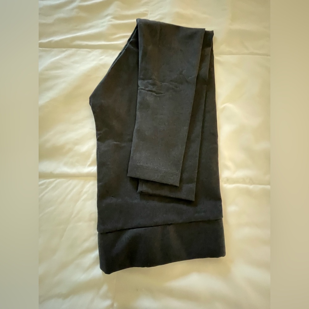 Super comfortable can be dressed up or down. Material is silky soft.